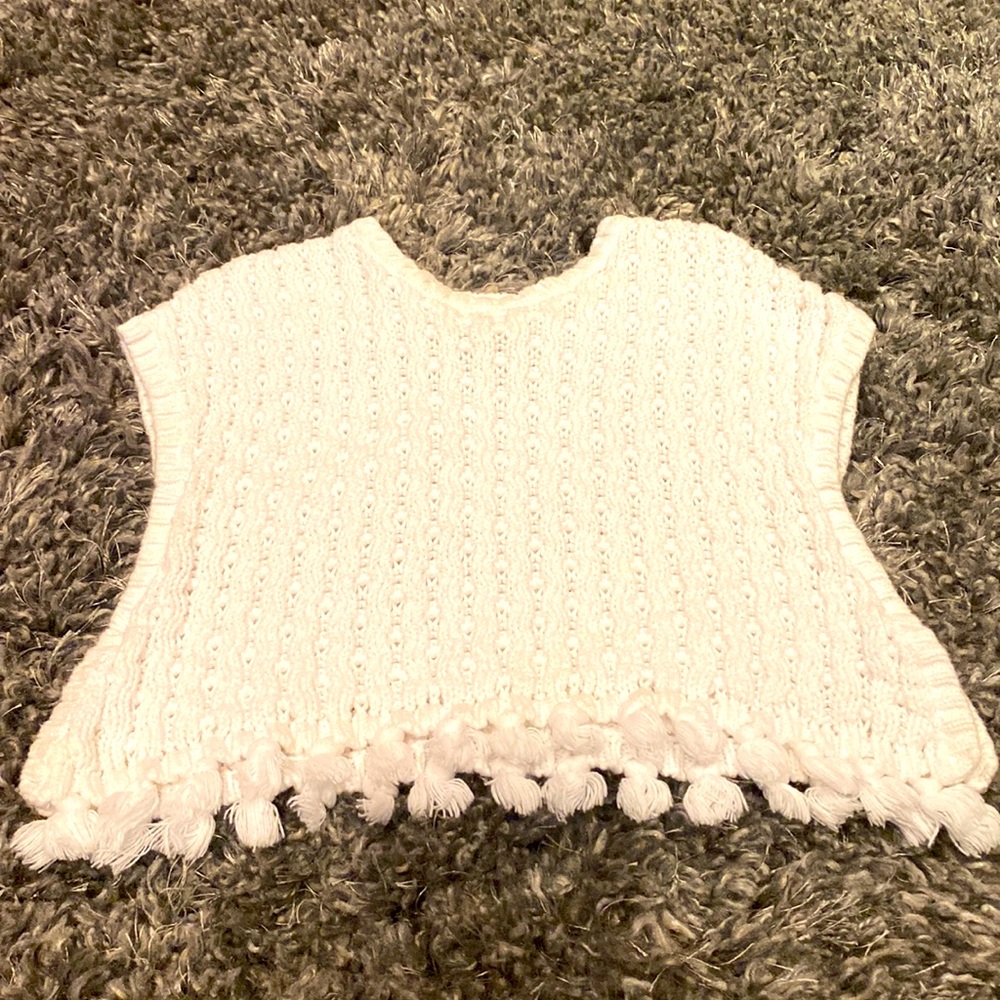 Carter’s white knit poncho